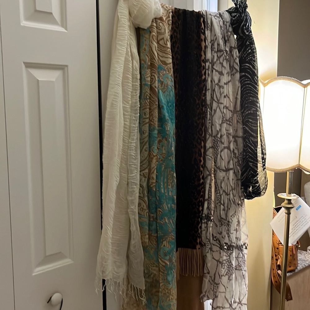 Five. Beautiful scarves all in very good condition.
